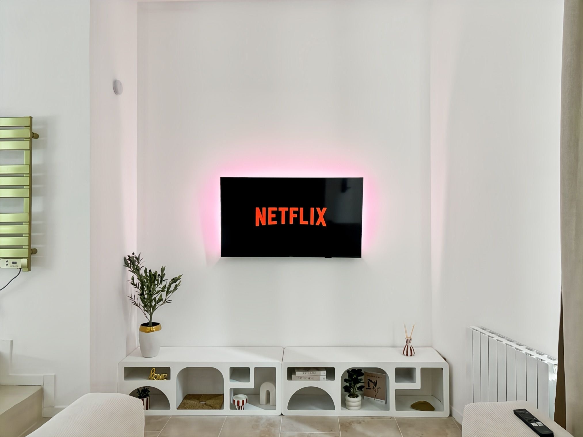 Connected screen with pink ambient lighting