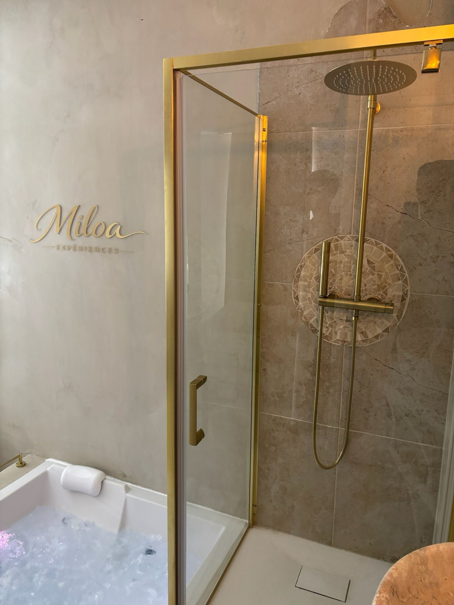Detail of the gold shower fixtures