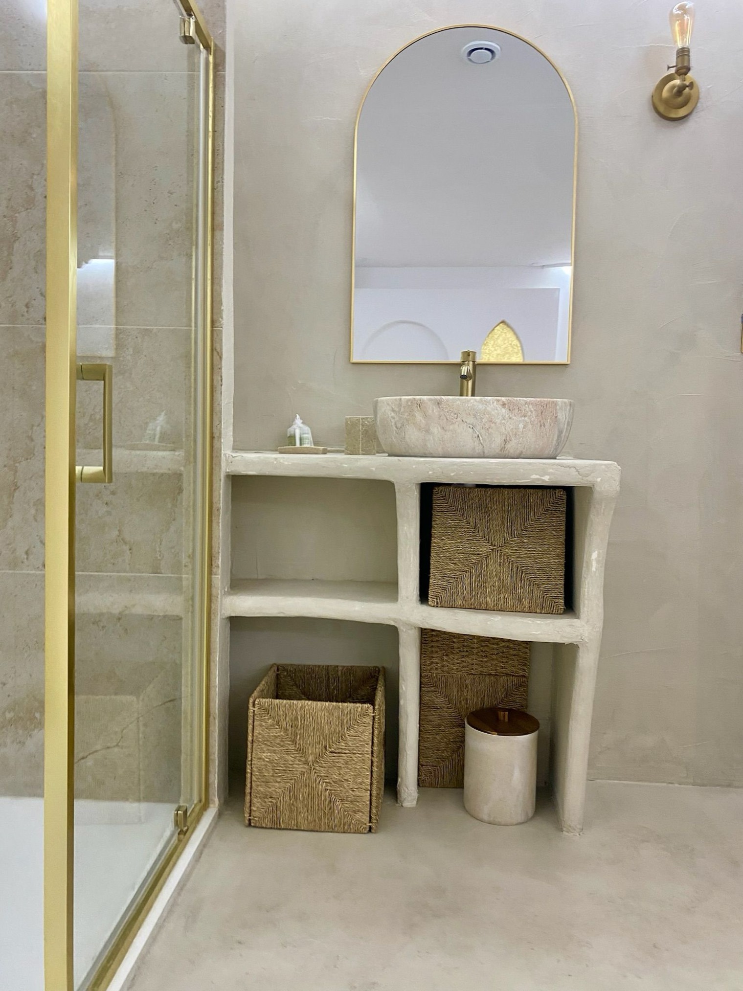 Stone basin and wicker storage
