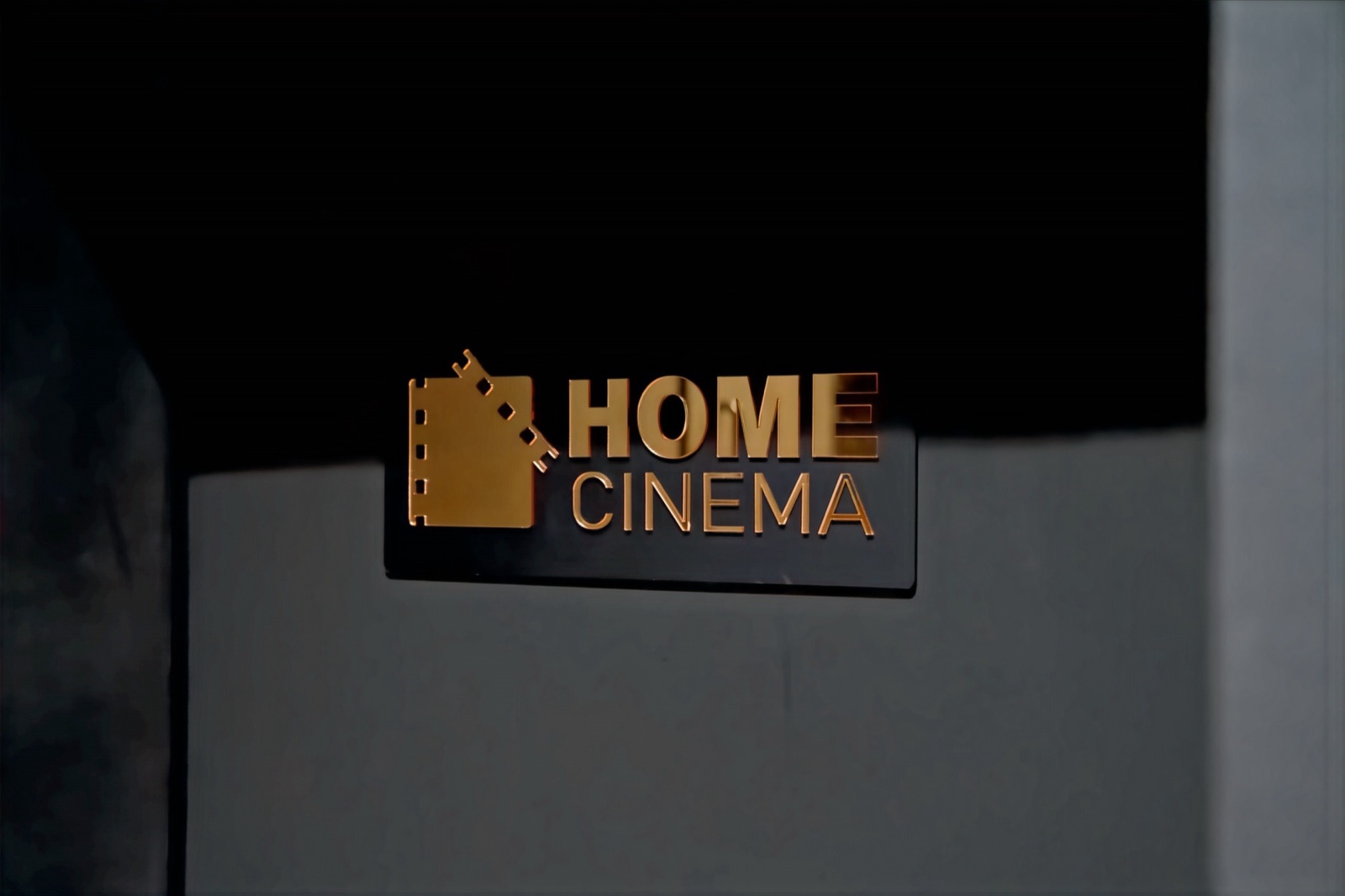 Gold Home Cinema plaque at the suite entrance