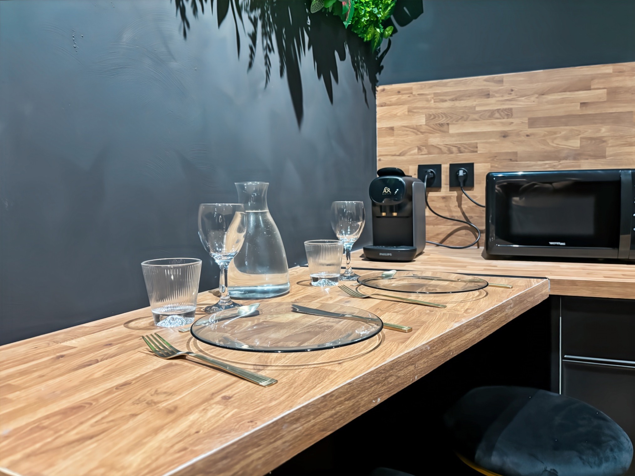 Table set for two at the kitchenette bar